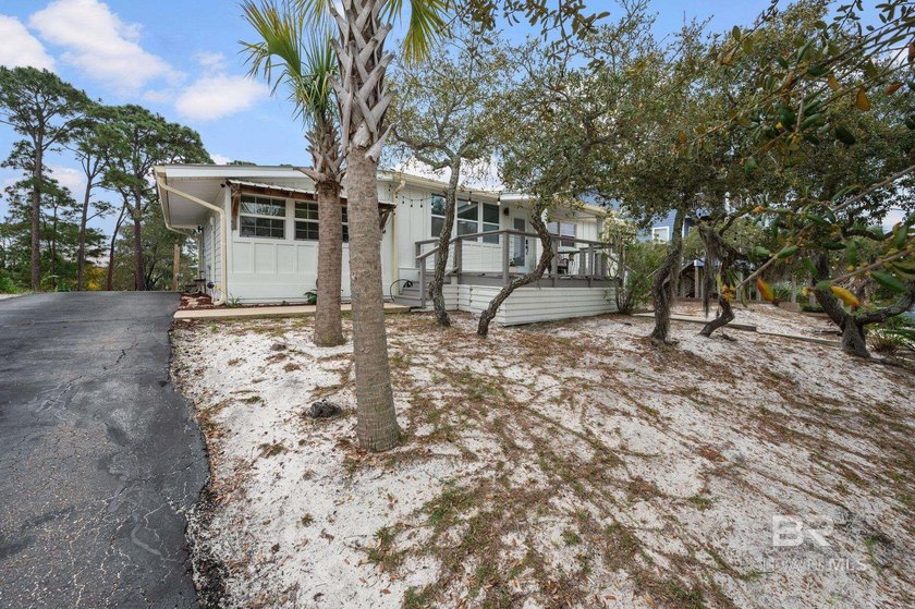 Perched high on one of Gulf Shores' most elevated points, this - photo 3