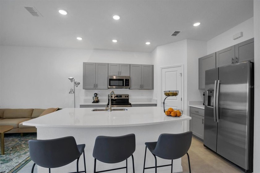 Welcome to this beautifully maintained, move-in ready townhome - photo 13