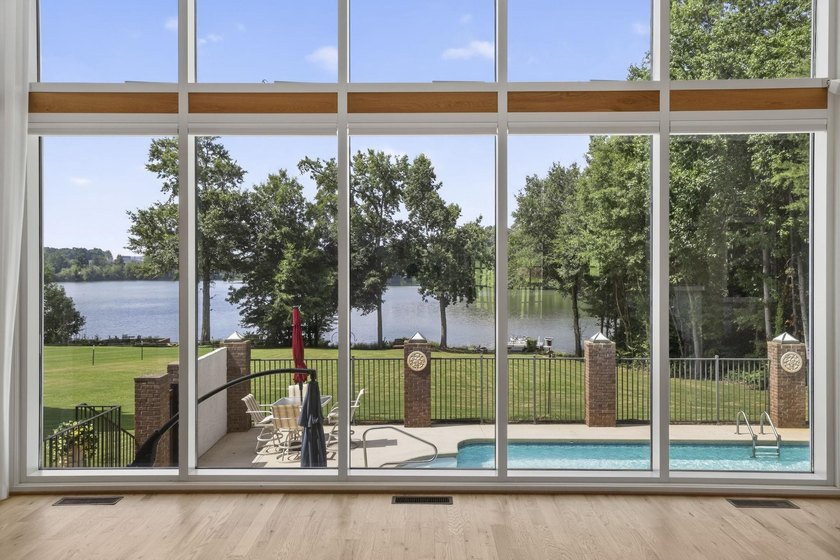 Welcome to 227 Woodlake Dr, an extraordinary lakefront retreat - photo 13