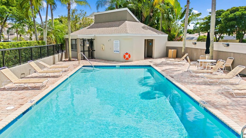 Nestled in the heart of Boca Raton, this two story townhome on a - photo 19