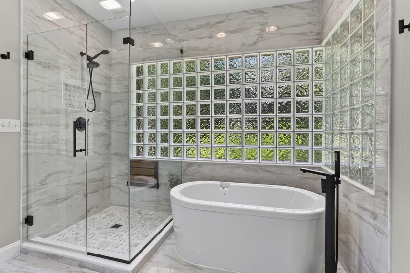 Welcome to 227 Woodlake Dr, an extraordinary lakefront retreat - photo 26