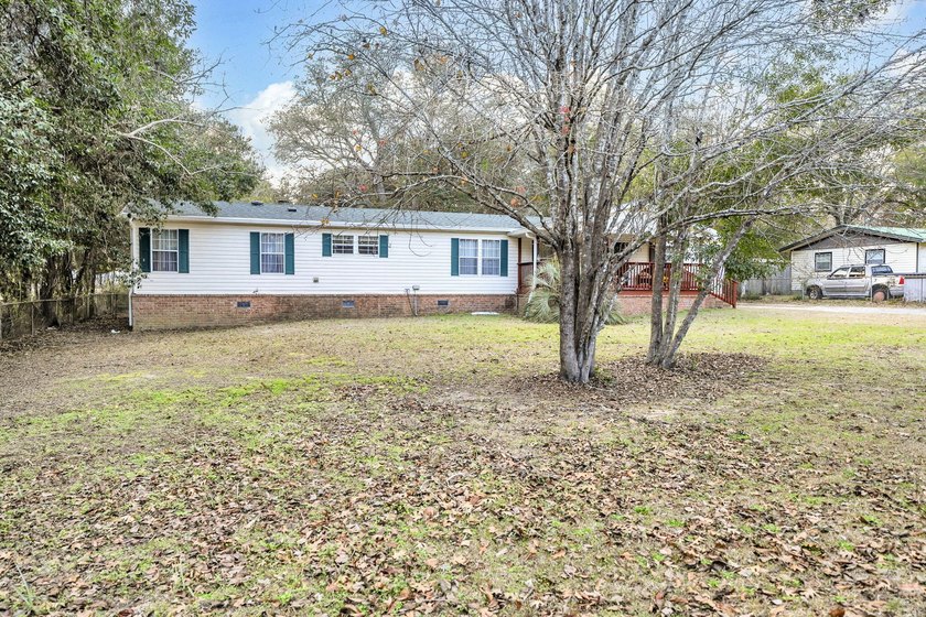 Welcome to 1422 Cat Mar Rd in Niceville -- a spacious and - photo 3