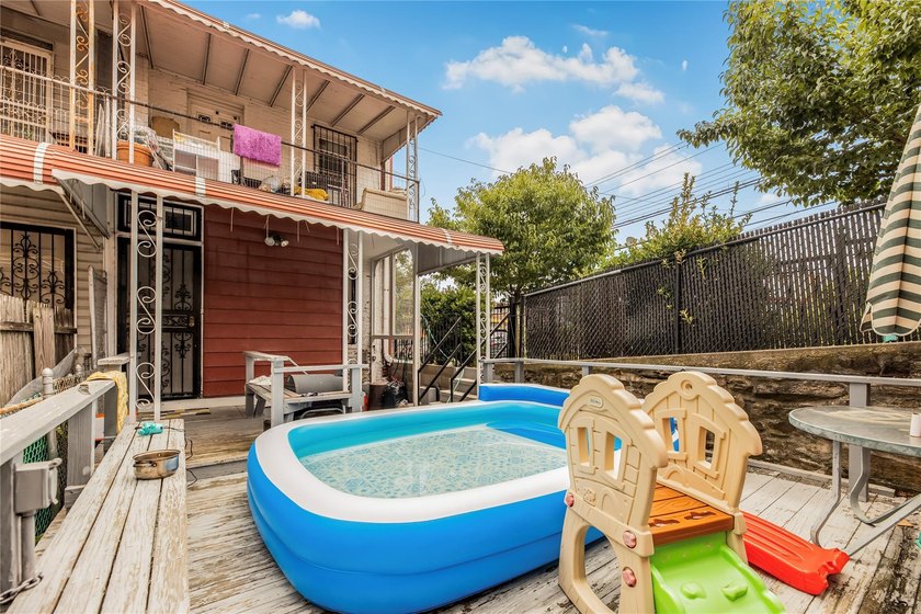 Welcome to 4101 Paulding Avenue, a charming brick single-family - photo 7