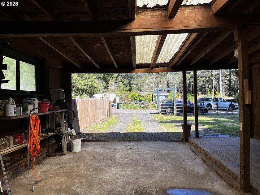 This charming 2-bedroom, 1-bath manufactured home sits on a - photo 8
