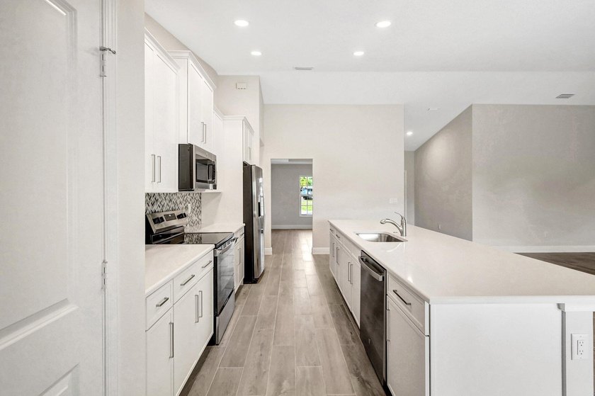 THE AMAZING IBIS MODEL. BUILT BY AWARD WINNING SYNERGY HOMES - photo 11