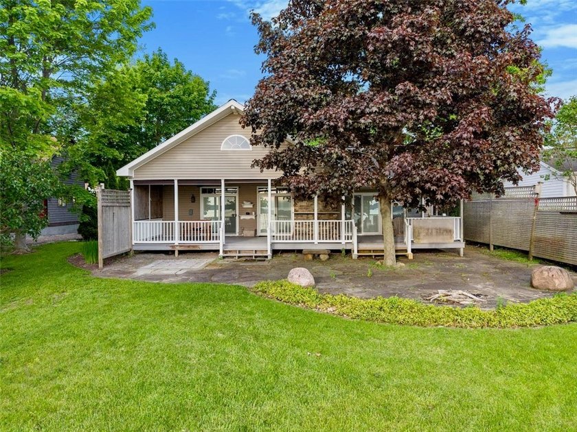 Welcome to 13 Main Street! A rare, custom-designed property on - photo 4