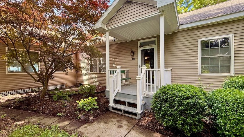 Welcome to 13 Main Street! A rare, custom-designed property on - photo 8