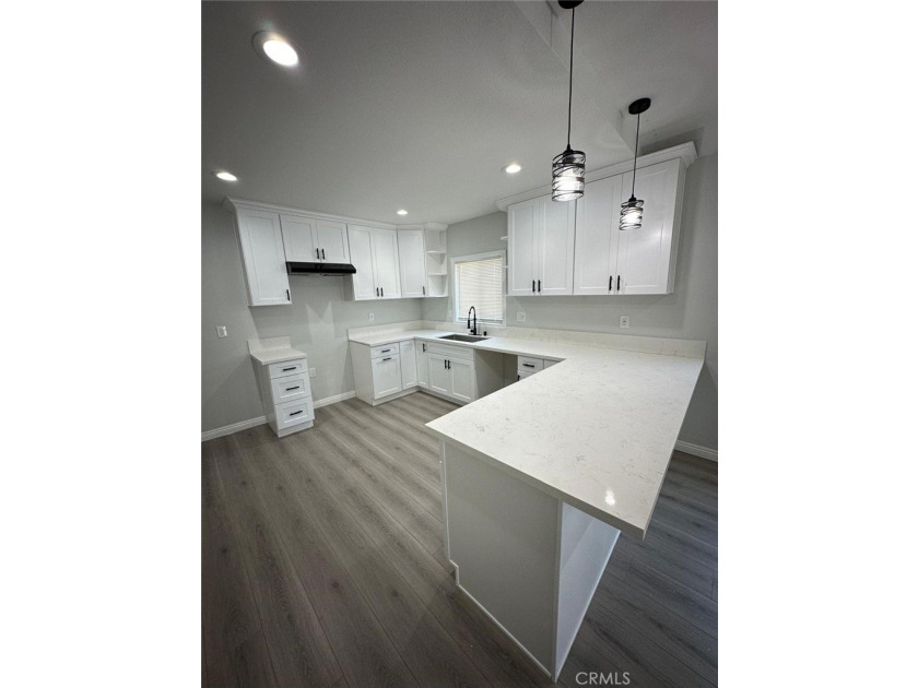 Welcome to 1131 E. 21st St, a rare and versatile - photo 16