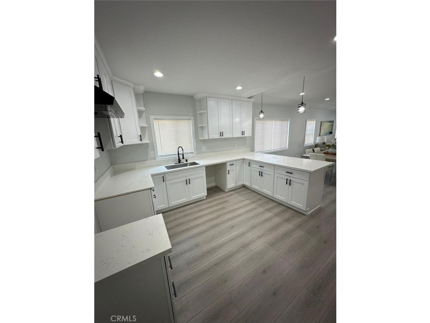 Welcome to 1131 E. 21st St, a rare and versatile - photo 17