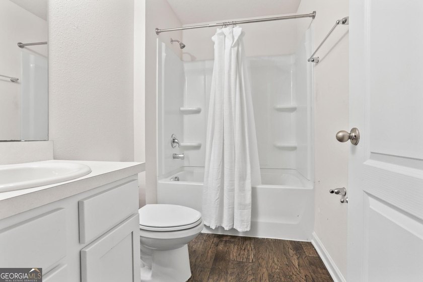Welcome to Bartram Place! This 3-bedroom, 2-bath home offers a - photo 7