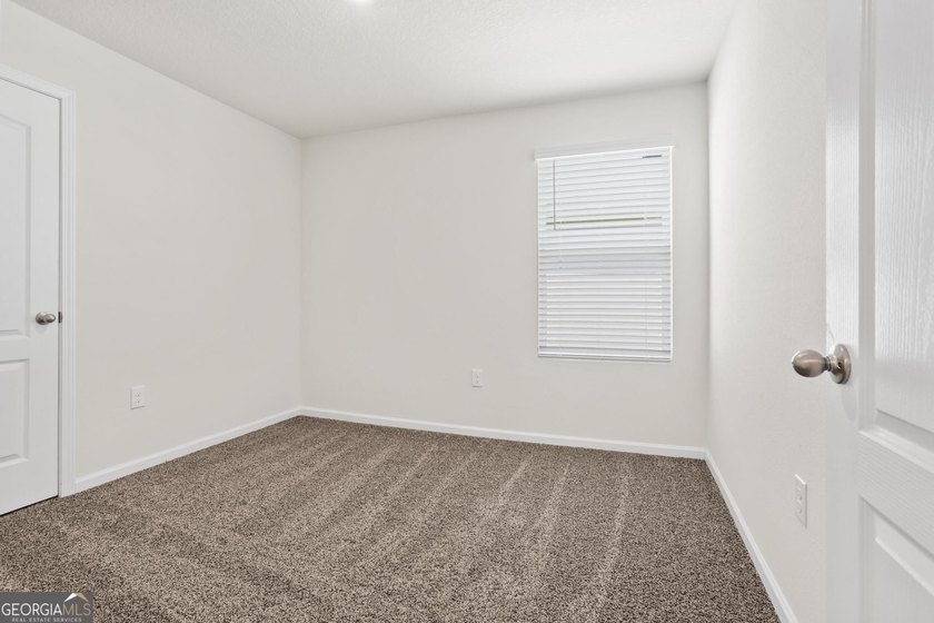 Welcome to Bartram Place! This 3-bedroom, 2-bath home offers a - photo 9