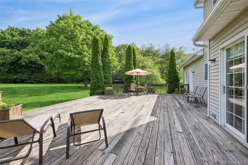 Welcome to 3 Naomi Court, a timeless 5-bedroom, 4.5-bath Center - photo 35