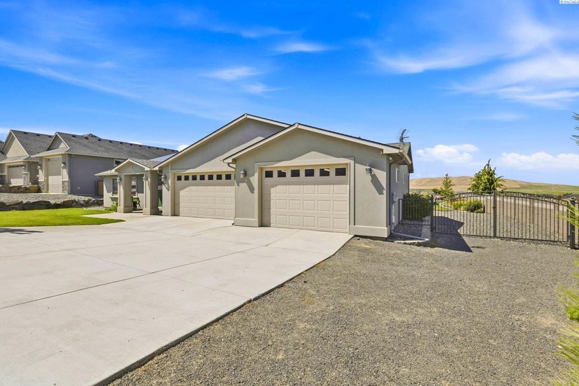 MLS# 293773 Perched on over half an acre, this stunning - photo 3