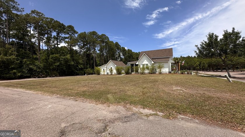 A cleared and build-ready lot in Cumberland Harbour, bring your - photo 5