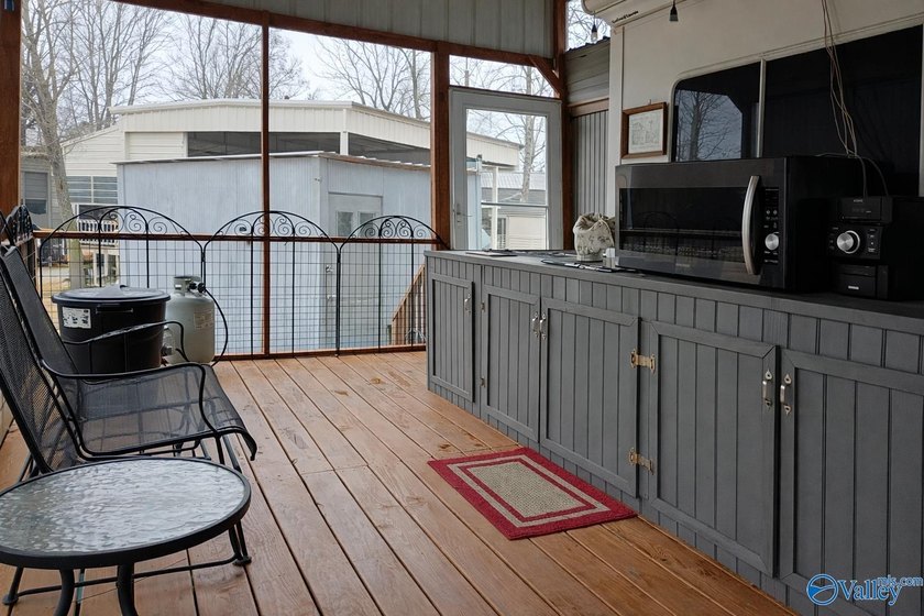 Enjoy LAKE LIVING with this spacious water view property located - photo 14