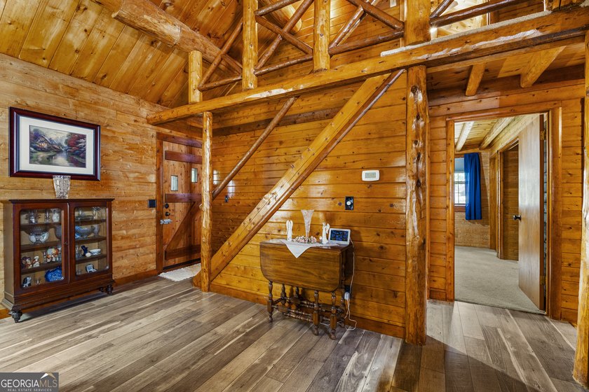 Rustic charm meets modern comfort in this beautiful log home - photo 3