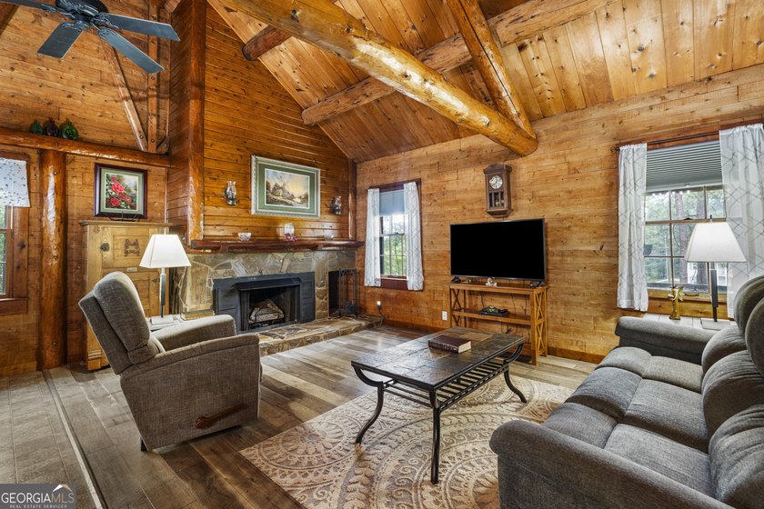 Rustic charm meets modern comfort in this beautiful log home - photo 4