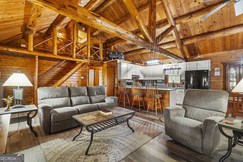 Rustic charm meets modern comfort in this beautiful log home - photo 7