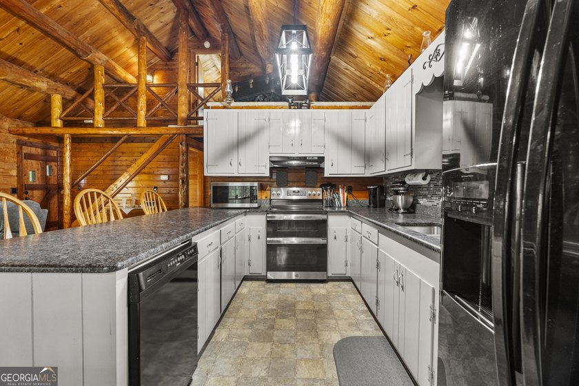 Rustic charm meets modern comfort in this beautiful log home - photo 9