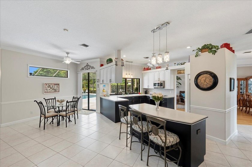 Come see this hidden 4/2/2 with a waterfront pond view in the - photo 11