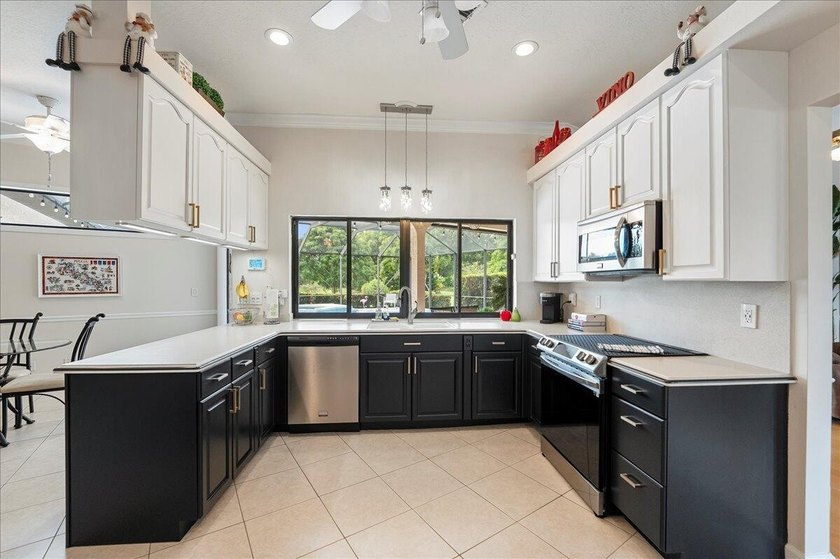 Come see this hidden 4/2/2 with a waterfront pond view in the - photo 13