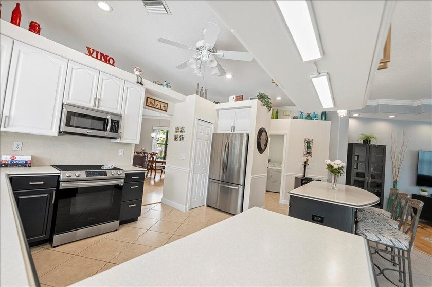 Come see this hidden 4/2/2 with a waterfront pond view in the - photo 15