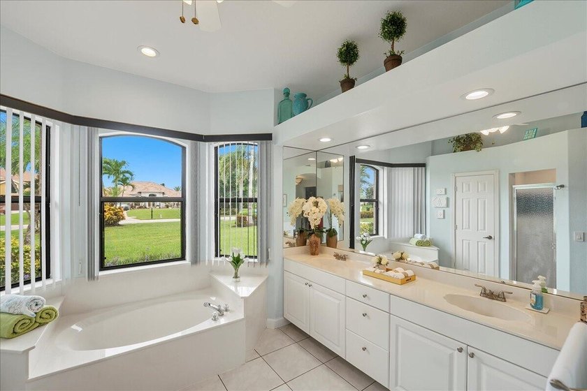 Come see this hidden 4/2/2 with a waterfront pond view in the - photo 28