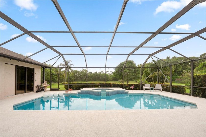 Come see this hidden 4/2/2 with a waterfront pond view in the - photo 45