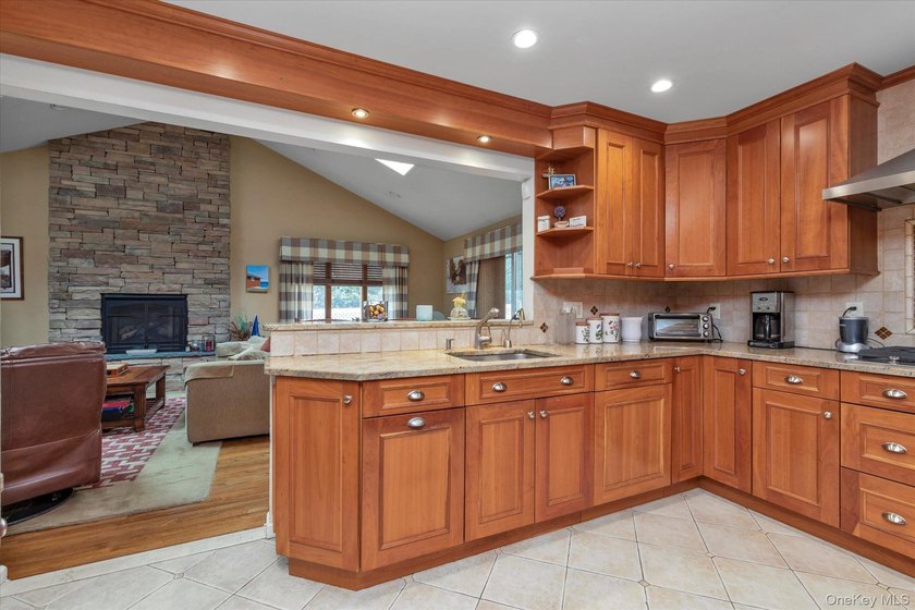 Welcome to 37 Rose Lane, a beautifully maintained 4-bedroom, 3 - photo 9