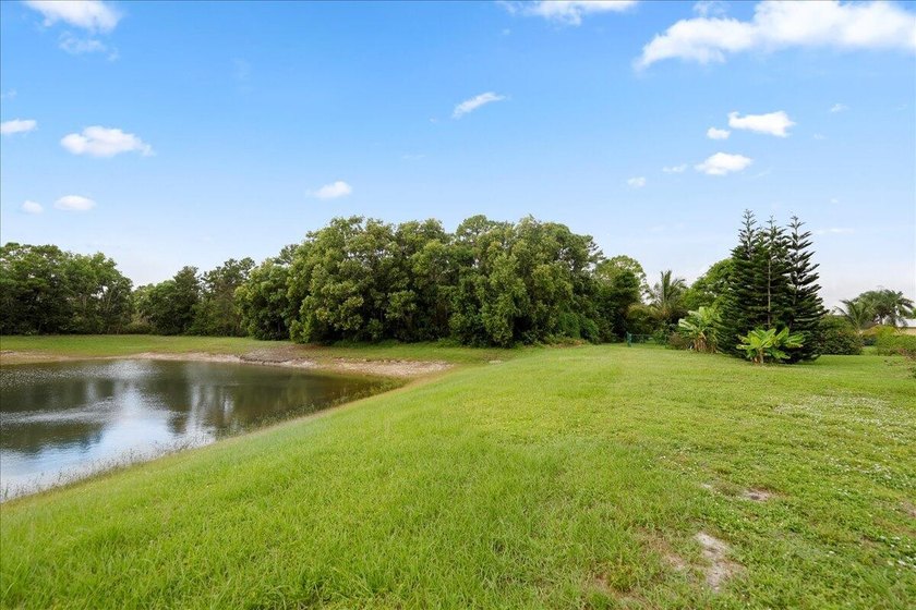 Come see this hidden 4/2/2 with a waterfront pond view in the - photo 49