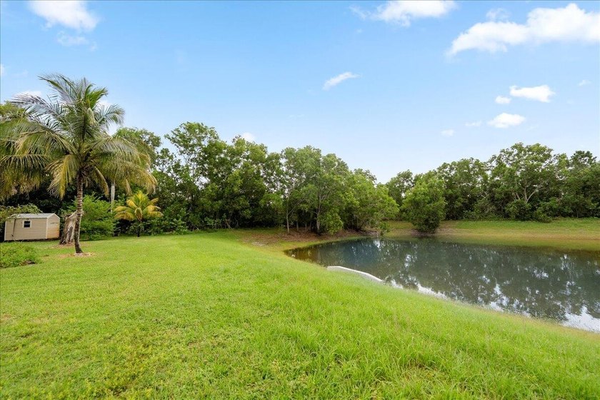 Come see this hidden 4/2/2 with a waterfront pond view in the - photo 50