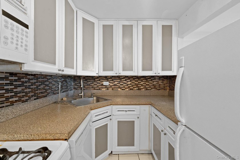 This 8th floor apartment at 3121 Middletown Road is a bright and - photo 5