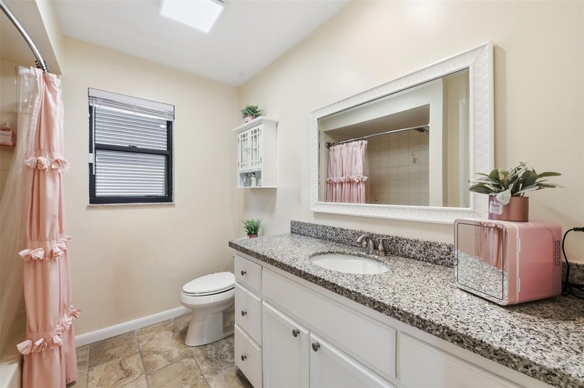 Experience refined living in this beautifully maintained - photo 20
