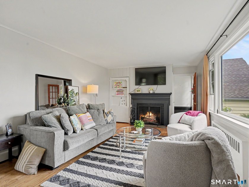 Welcome home to this charming Cape nestled in a sought-after - photo 4