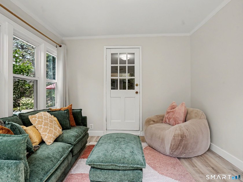 Welcome home to this charming Cape nestled in a sought-after - photo 8