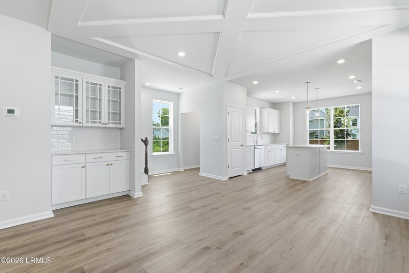 This two-story home includes three bedrooms and two-and-one-half - photo 9