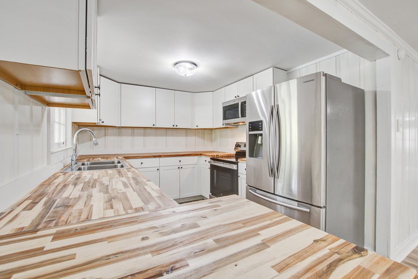 Fully renovated and ready to impress, this beautiful home at 93 - photo 21