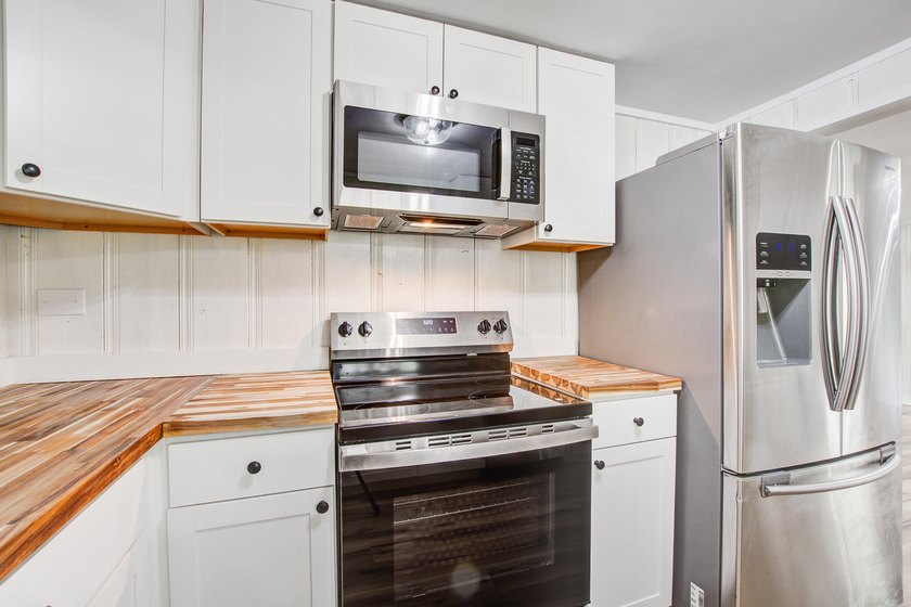 Fully renovated and ready to impress, this beautiful home at 93 - photo 22