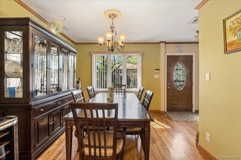 Rarely Available in Coveted Beechhurst! This impeccably - photo 7