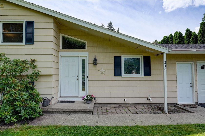 Welcome to 243 Eden Lane in the town of Greece, where this - photo 2
