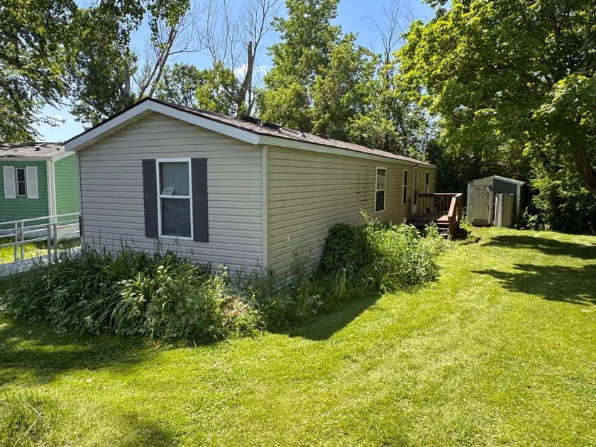 Experience small-town charm in Milaca, MN! This 2 bedroom/2 bath - photo 2