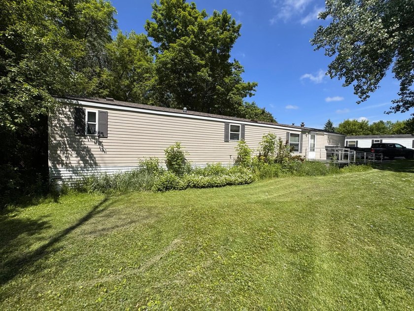 Experience small-town charm in Milaca, MN! This 2 bedroom/2 bath - photo 3