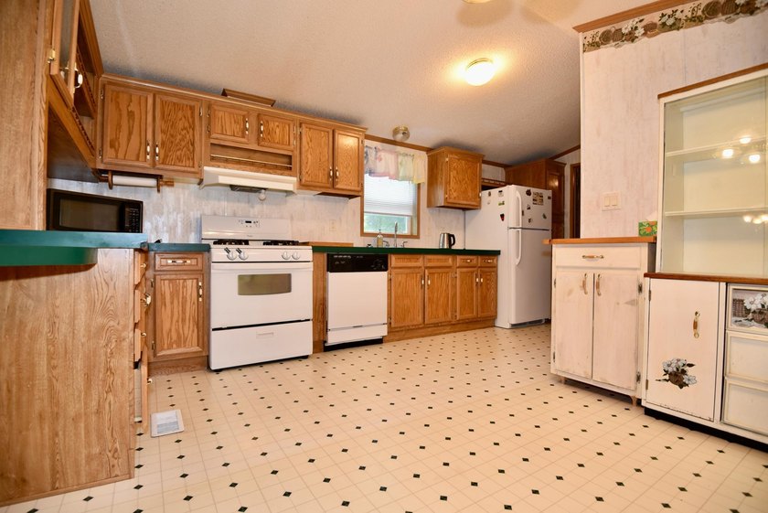 Experience small-town charm in Milaca, MN! This 2 bedroom/2 bath - photo 5