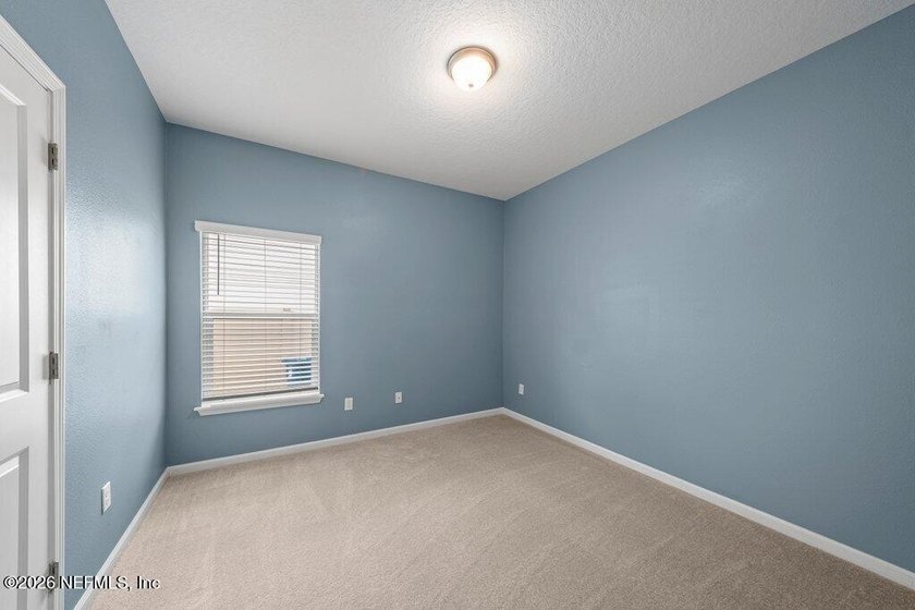 Welcome to this beautifully maintained 4 bedroom, 3 bathroom - photo 12