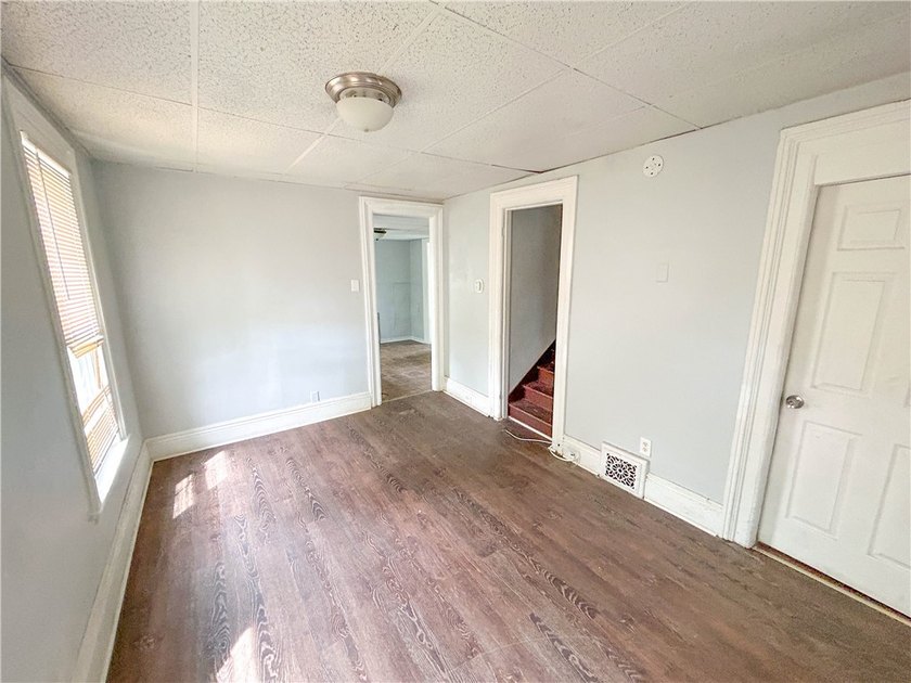This spacious 4-bedroom, 1.5-bath Colonial in the City of - photo 2