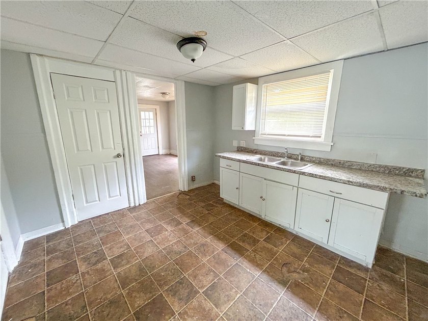 This spacious 4-bedroom, 1.5-bath Colonial in the City of - photo 9