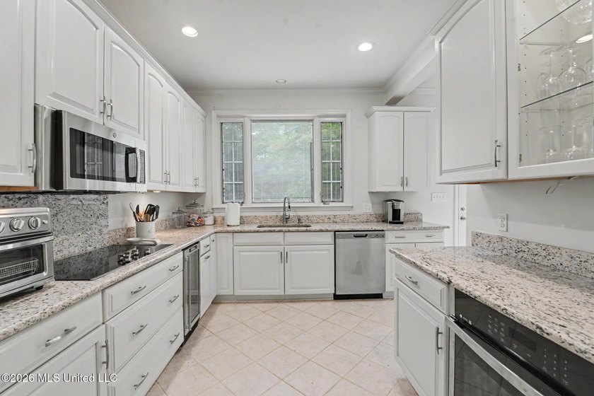 Tucked away on 4.5 acres this private estate blends timeless - photo 11