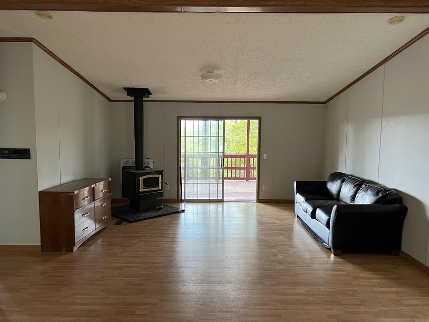 Nestled on 20 beautiful wooded acres, this 3-bedroom, 2-bath - photo 12