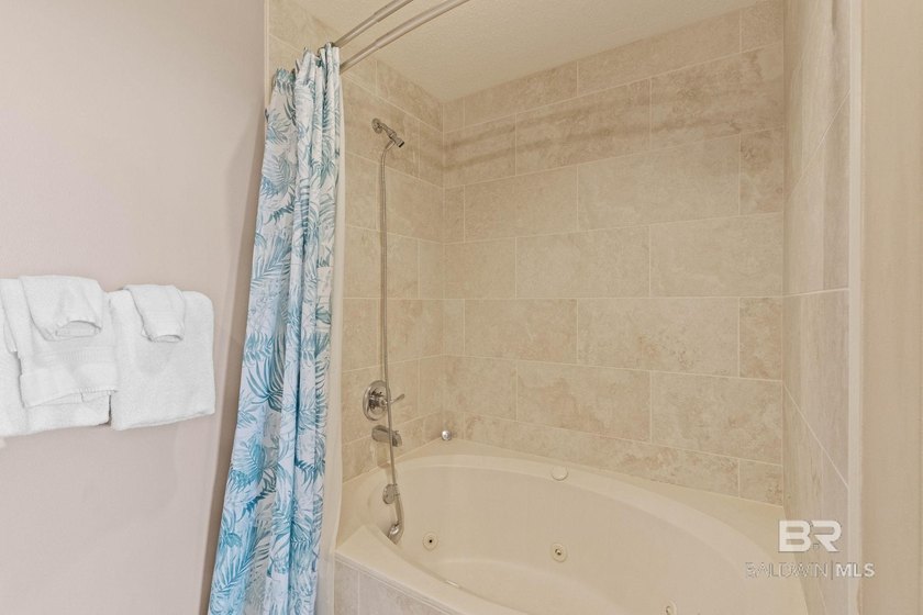 Welcome to this beautifully updated ground-level condo in the - photo 22