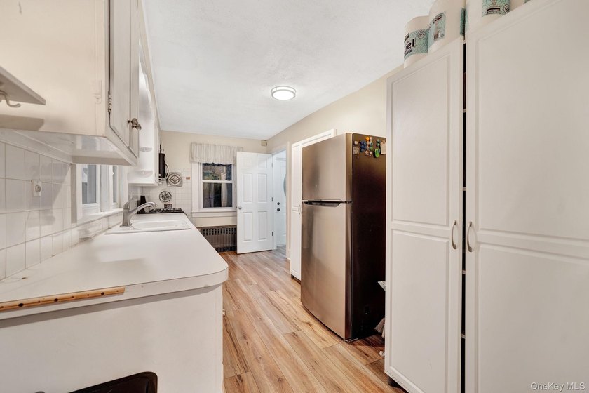 Filled with warmth and opportunity, this 3 bedroom, 1 bath Cape - photo 16